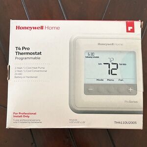 Honeywell T4 Pro Programmable Thermostat - White. New never been opened.